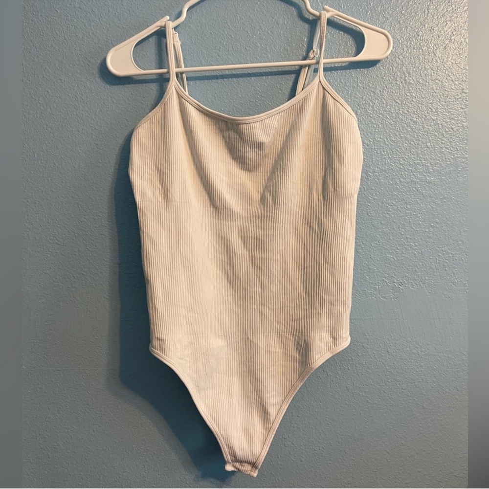 Womens White Ribbed One-Piece Bodysuit